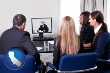 businesspeople participating in a video conference - with California icon
