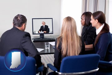 businesspeople participating in a video conference - with Indiana icon