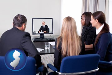 businesspeople participating in a video conference - with New Jersey icon