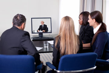 businesspeople participating in a video conference